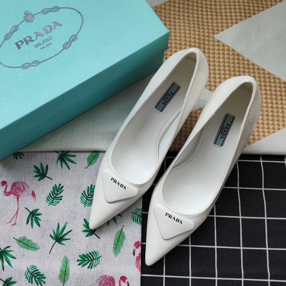Prada White Pointed Leather Pumps with Logo Plaque